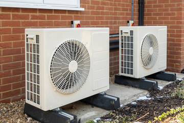 0 Man inspecting HVAC